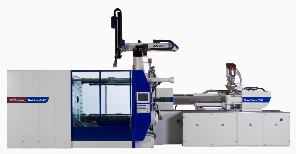 Obr. 2: MacroPower 1000/8800 s robotem WITTMANN W843 Obr. 2: MacroPower 1000/8800 s robotem WITTMANN W843
